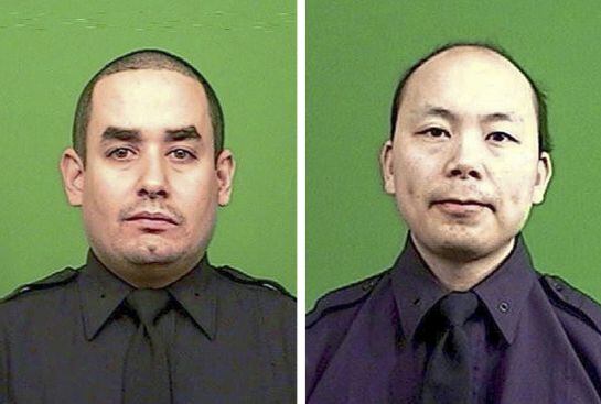 Rafael Ramos y Wenjian Liu, los dos agentes de policía tiroteados a sangre fría en Nueva York.