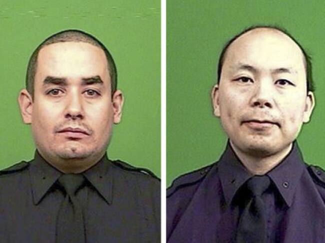 Rafael Ramos y Wenjian Liu, los dos agentes de policía tiroteados a sangre fría en Nueva York.
