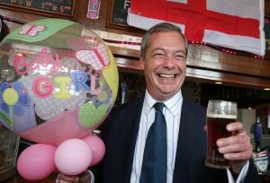 RAMSGATE, ENGLAND - MAY 02: UK Independence Party leader Nigel Farage celebrates the arrival of the new royal baby with a &#039;baby Girl&#039; balloon in a pub on May 2, 2015 in Ramsgate, England. Mr Farage is spending the last weekend before the election attendin