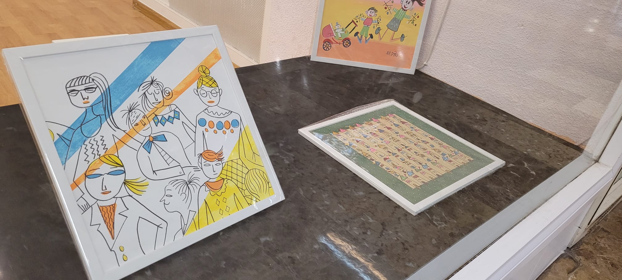 Algunas de las obras realizadas en el taller en la exposición del Centro Comercial Isilla