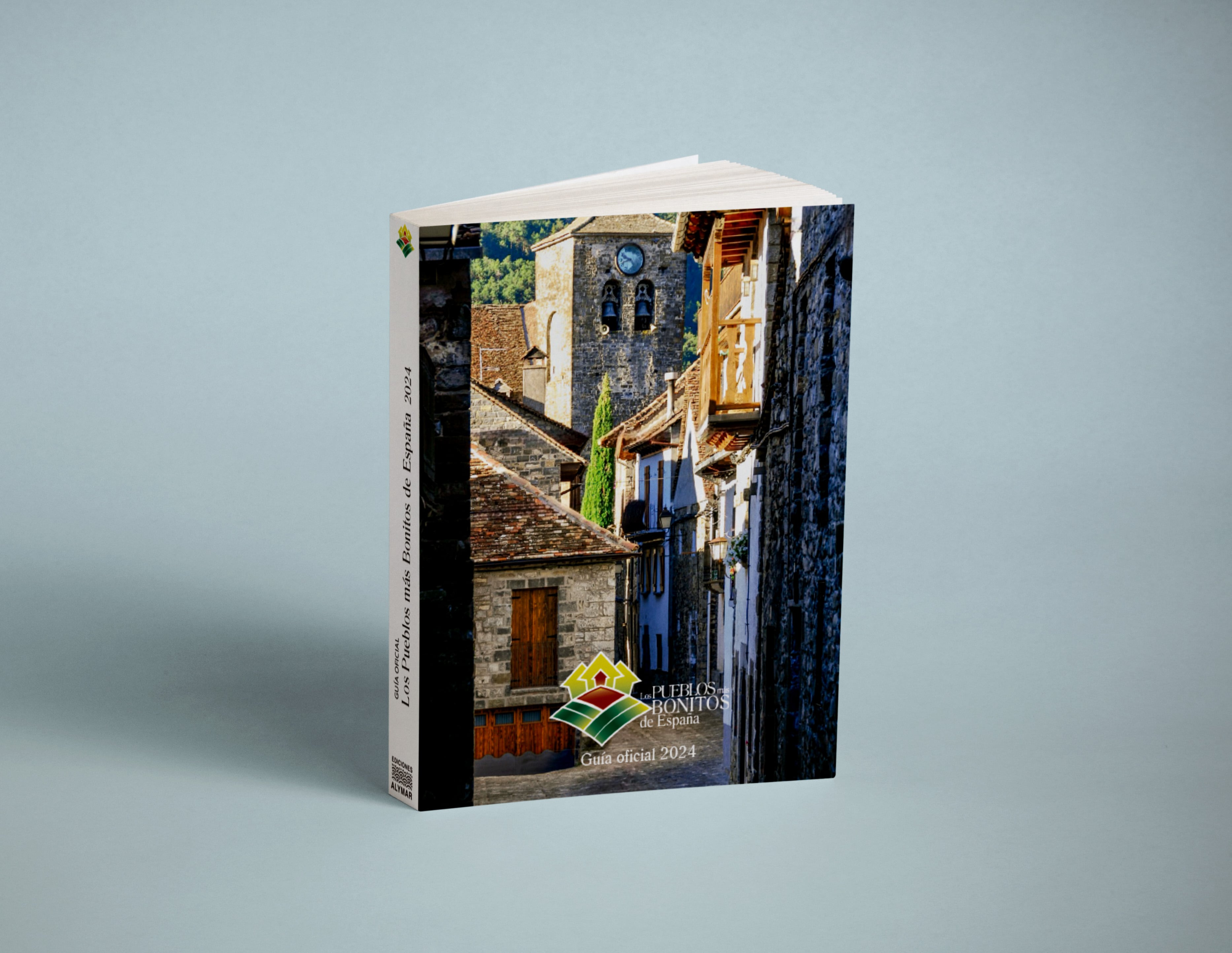 La imagen de la portada de la Guía muestra sus casas típicas, construcciones de piedra, madera, forja y teja