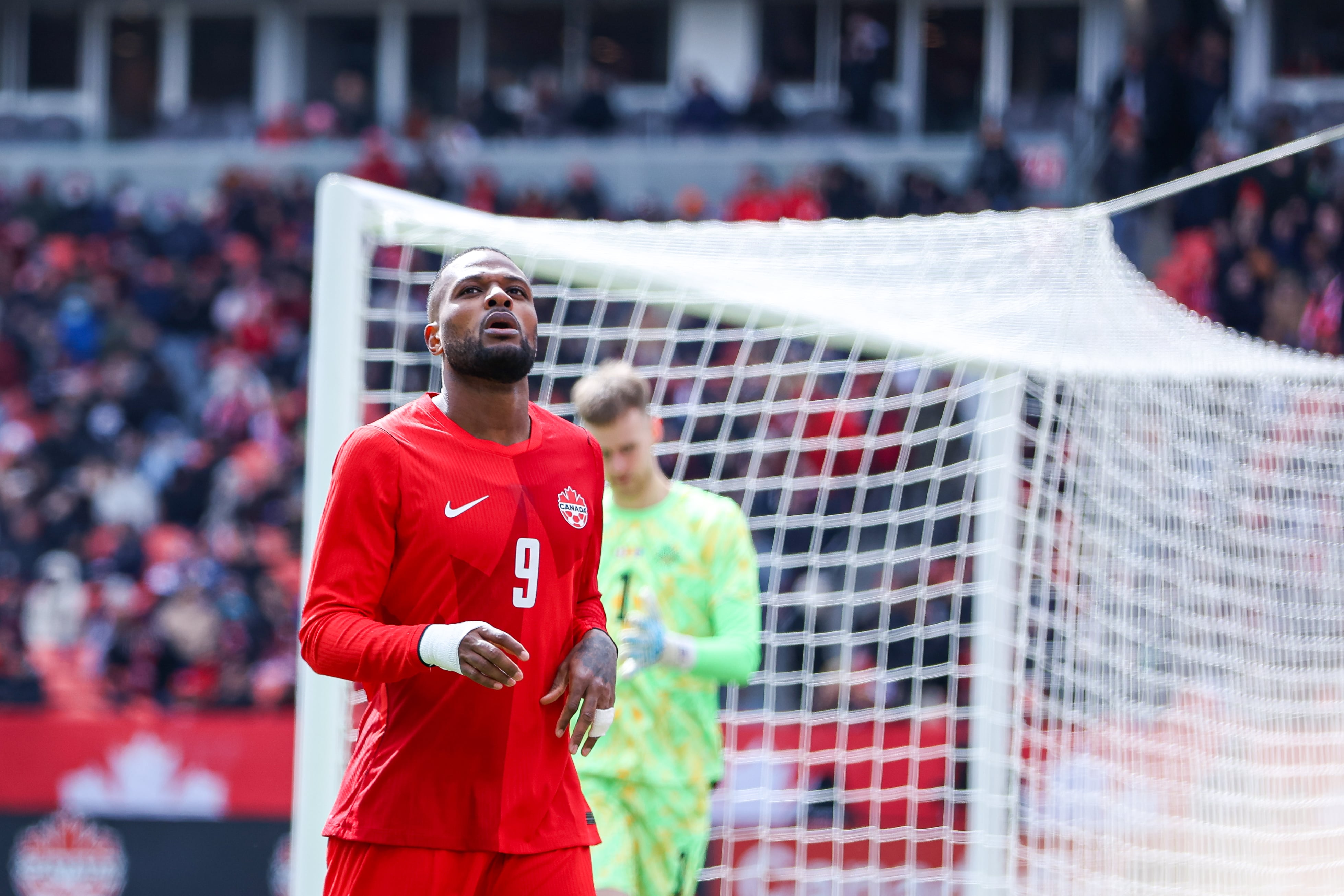 Team Canada striker Cyle Larin #9 looks at the sky after failing to score a goal during an international friendly match between Canada and Iceland at BMO Field in Toronto, Ontario, Canada, on March 28, 2026. (Photo by Indrawan Kumala/NurPhoto via Getty Images)