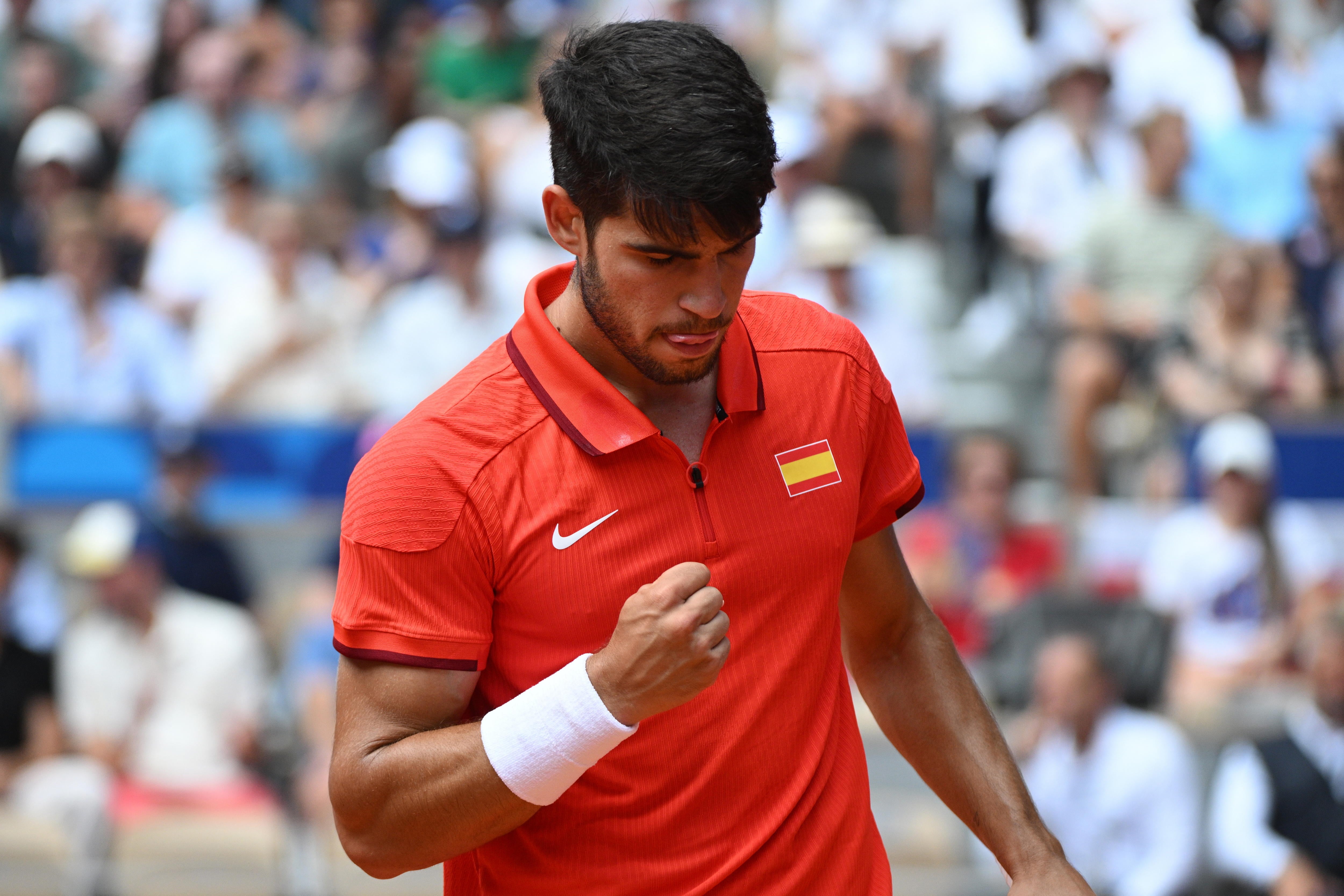 Carlos Alcaraz celebrando un punto frente a Auger-Aliassime