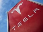 FILE PHOTO: A Tesla dealership is seen in West Drayton, just outside London, Britain, February 7, 2018. REUTERS/Hannah McKay/File Photo