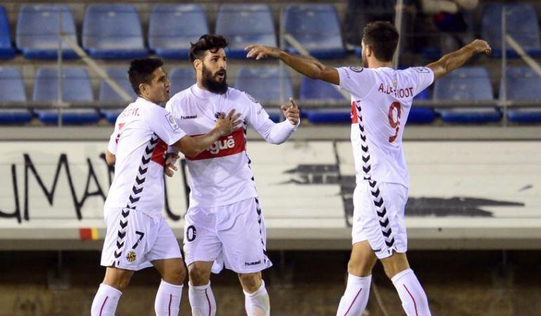 Marcos celebra el gol de l'empat contra el Numància amb Xisco Muñoz i Alex López.