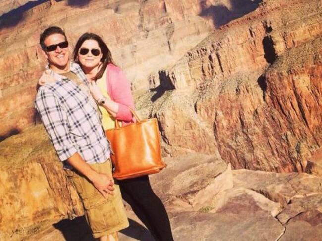 FILE - In this Oct. 21, 2014, file photo provided by TheBrittanyFund.org, Brittany Maynard, a terminally ill woman who plans to die under Oregon's law that allows the terminally ill to end their own lives, and her husband Dan Diaz pose at the Grand Canyon