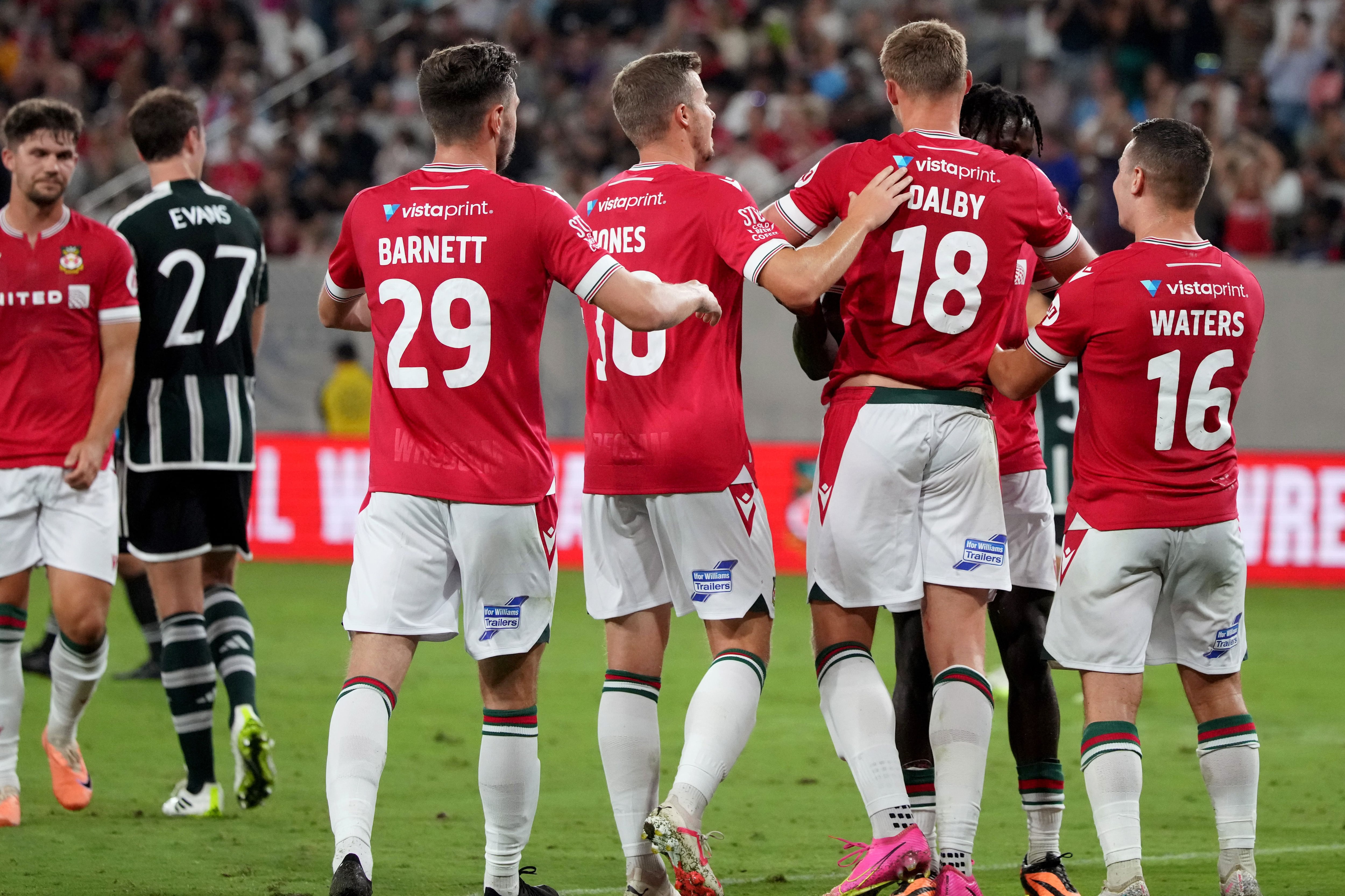 Jugadores del Manchester United celebran un gol de su equipo