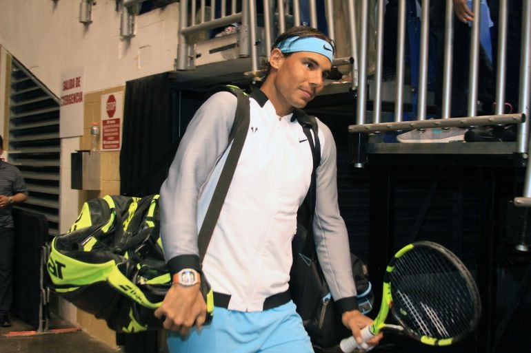 SAN JUAN, PUERTO RICO - MARCH 21:  Rafael Nadal makes the entrance to Exhibition Match between Rafael Nadal vs Victor Estrella at Coliseo Jose M. Agrelot on March 21, 2016 in San Juan, Puerto Rico.  (Photo by GV Cruz/WireImage)