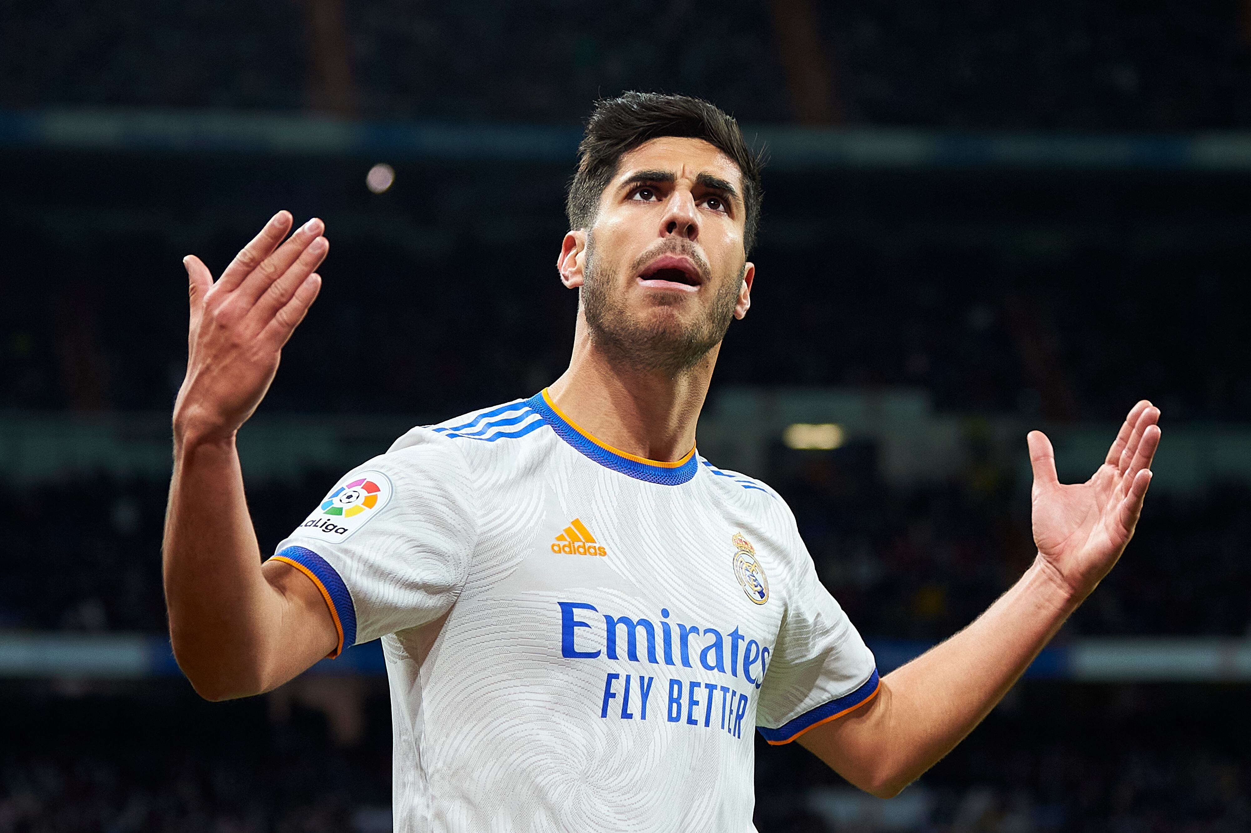 MADRID, SPAIN - FEBRUARY 19: Marco Asensio of Real Madrid CF celebrates after scoring his team&#039;s first goal during the LaLiga Santander match between Real Madrid CF and Deportivo Alaves at Estadio Santiago Bernabeu on February 19, 2022 in Madrid, Spain. (Photo by Silvestre Szpylma/Quality Sport Images/Getty Images)