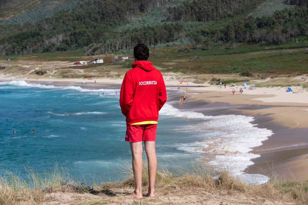 FERROL SPAIN - AUGUST 20:Ponzos Beach stretches for 1400 meters in the parish of Covas. It is a rectilinear beach, with white sand, windy and with strong waves. A lifeguard watches the beach,seen on August 20, 2020, Ferrol, Rias Altas region, Galicia, Spain. (Photo by Xurxo Lobato / Getty Images)