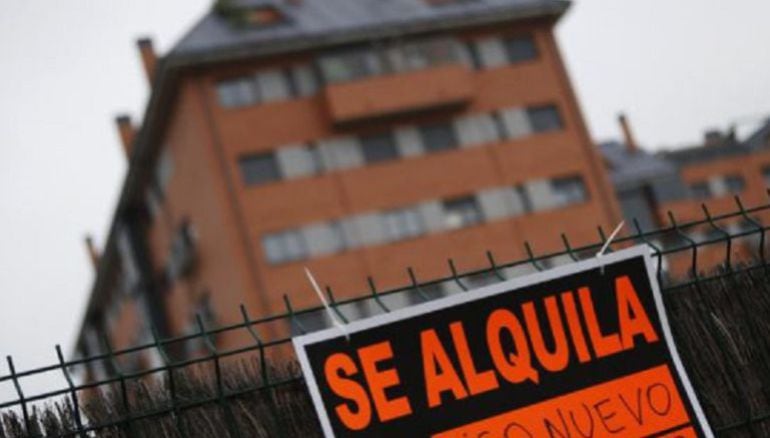 Cartel de alquiler de un bloque de pisos