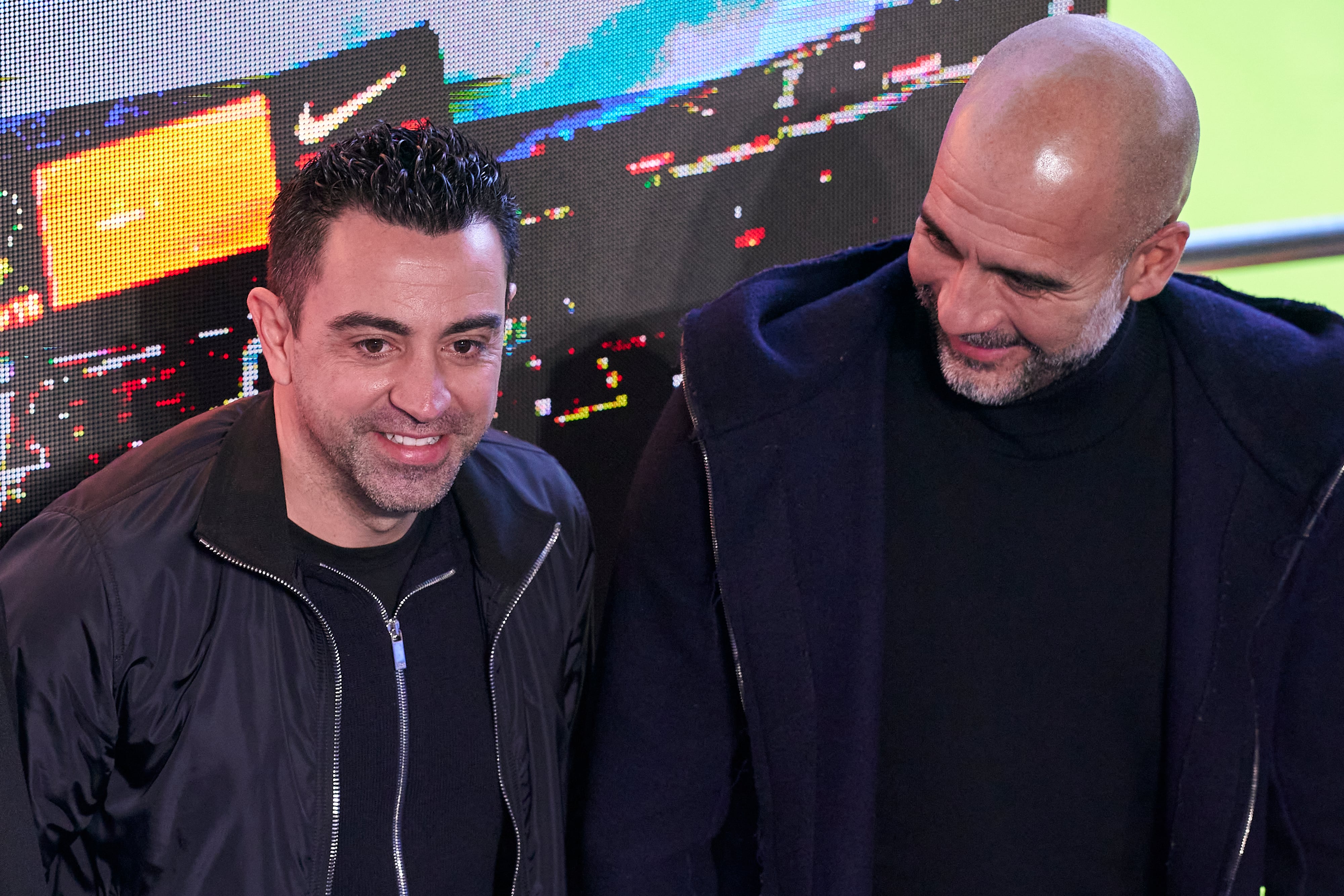 Xavi Hernández y Pep Guardiola, durante un acto en el Camp Nou