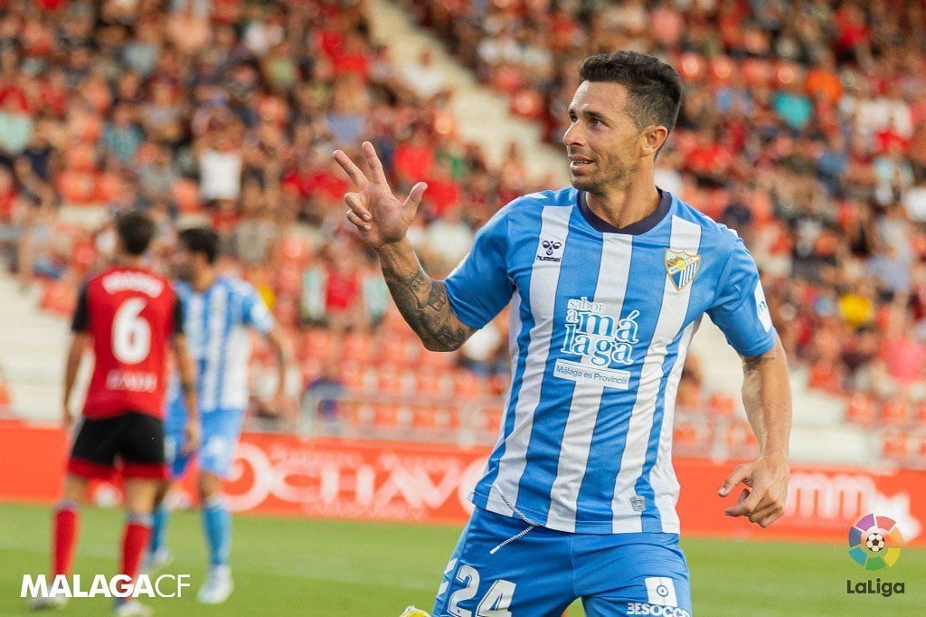 Rubén Castro celebra uno de sus tres goles como malaguista