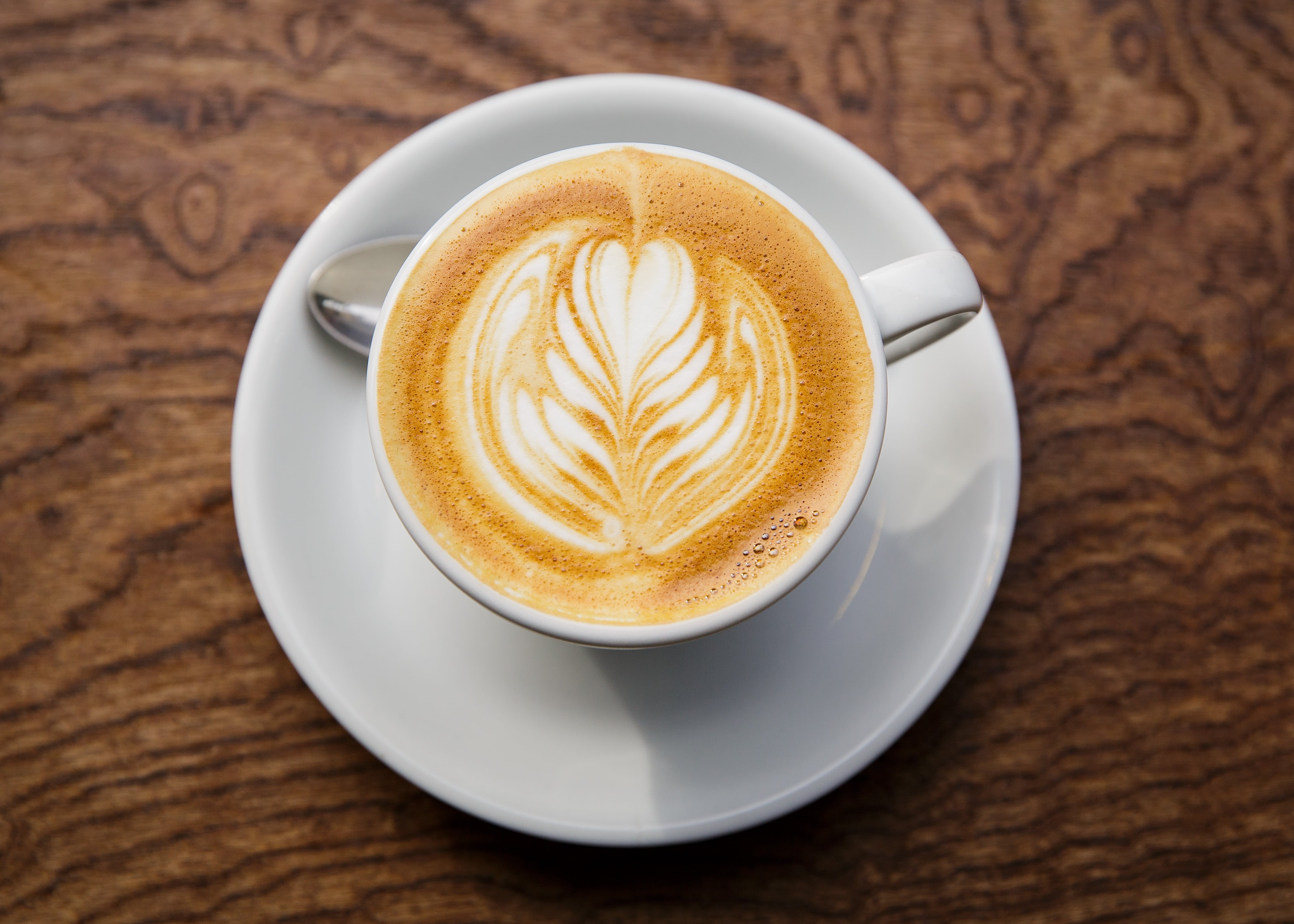 TOKYO, JAPAN - MAY 20:  A cafe latte is seen on a table at a local specialty coffee shop on May 20, 2016 in Tokyo, Japan. With the rise of specialty coffee shops opening all over the world in recent years, Tokyo&#039;s coffee culture catches on to offer quality coffee to like minded people across all walks of life. (Photo by Christopher Jue/Getty Images)