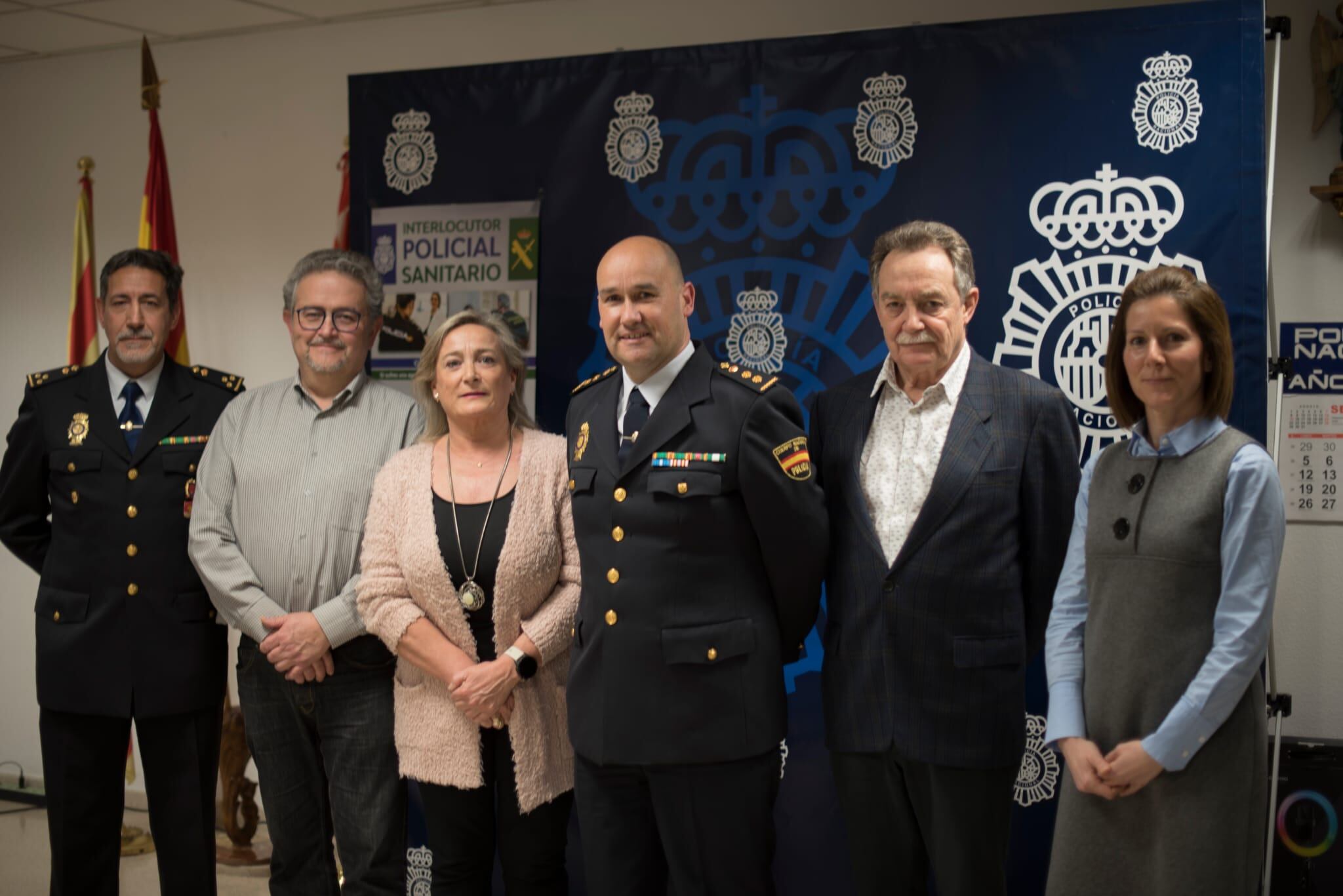 Representantes policiales junto a los presidentes de los colegios oficiales de Veterinarios, Enfermería, Médicos y Farmacéuticos de la provincia de Huesca