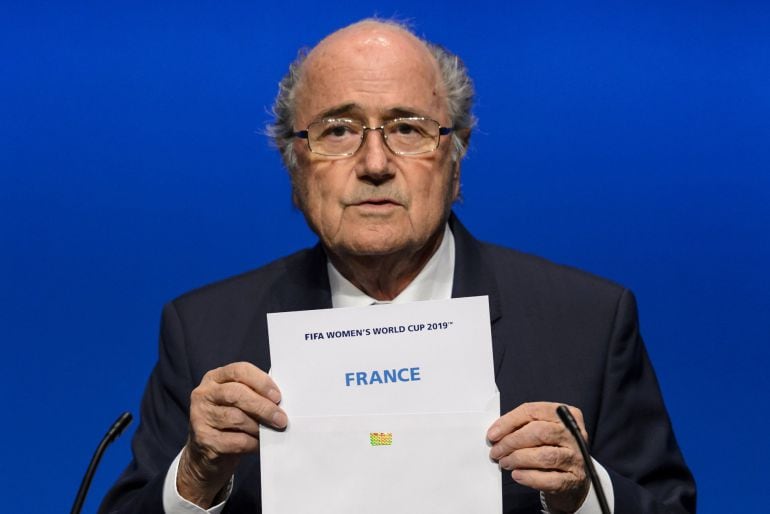 FIFA President Sepp Blatter shows the name of France, after FIFA&#039;s executive committee on March 19, 2015 decided that France will host the 2019 women&#039;s World Cup. FIFA&#039;s executive committee started a two-day meeting on March 19 to decide the dates of the 