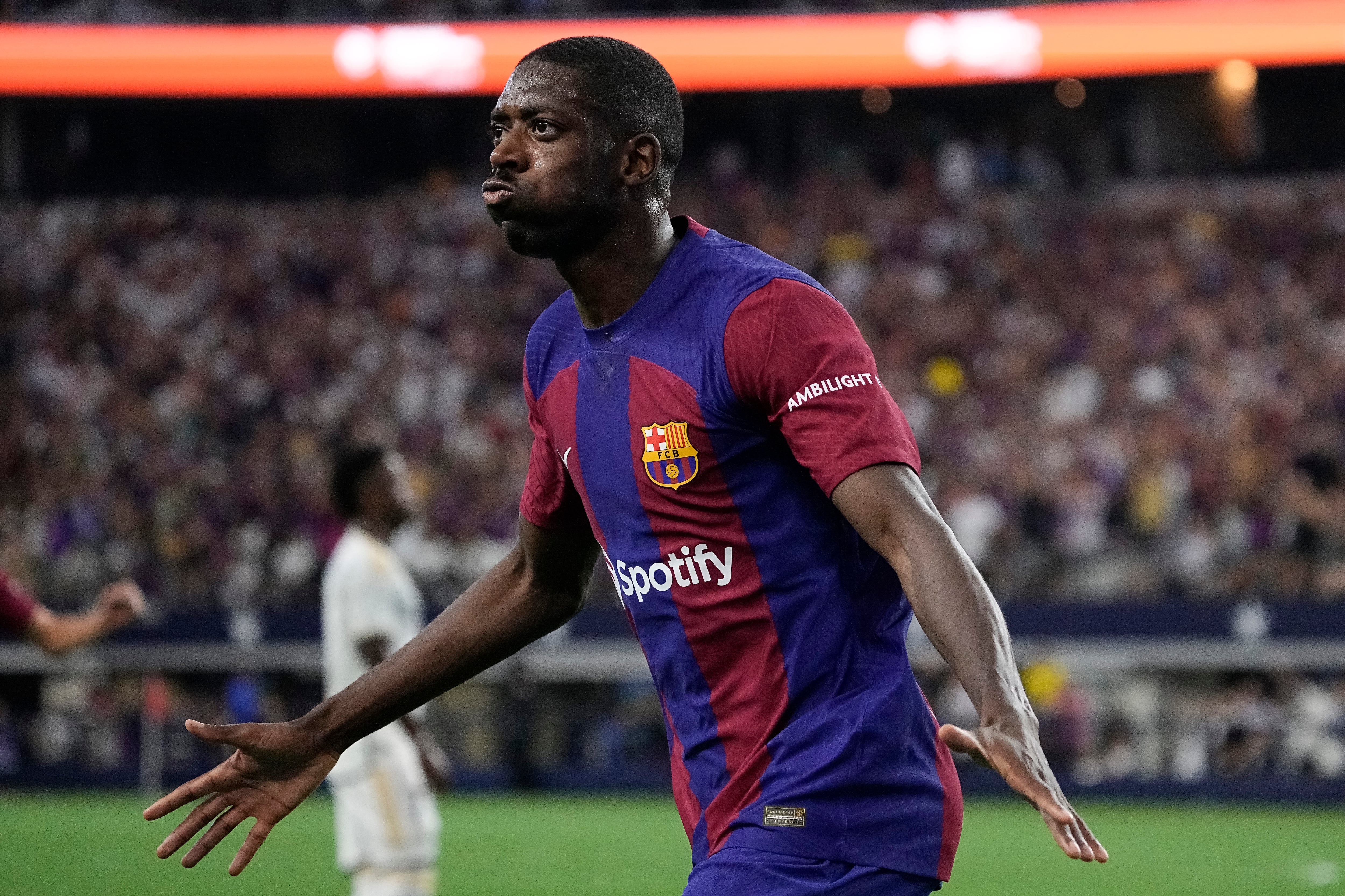 ARLINGTON, TEXAS - JULY 29: Ousmane Dembélé #7 of FC Barcelona celebrates after scoring a goal during the first half of a pre-season friendly match against Real Madrid at AT&T Stadium on July 29, 2023 in Arlington, Texas. (Photo by Sam Hodde/Getty Images)