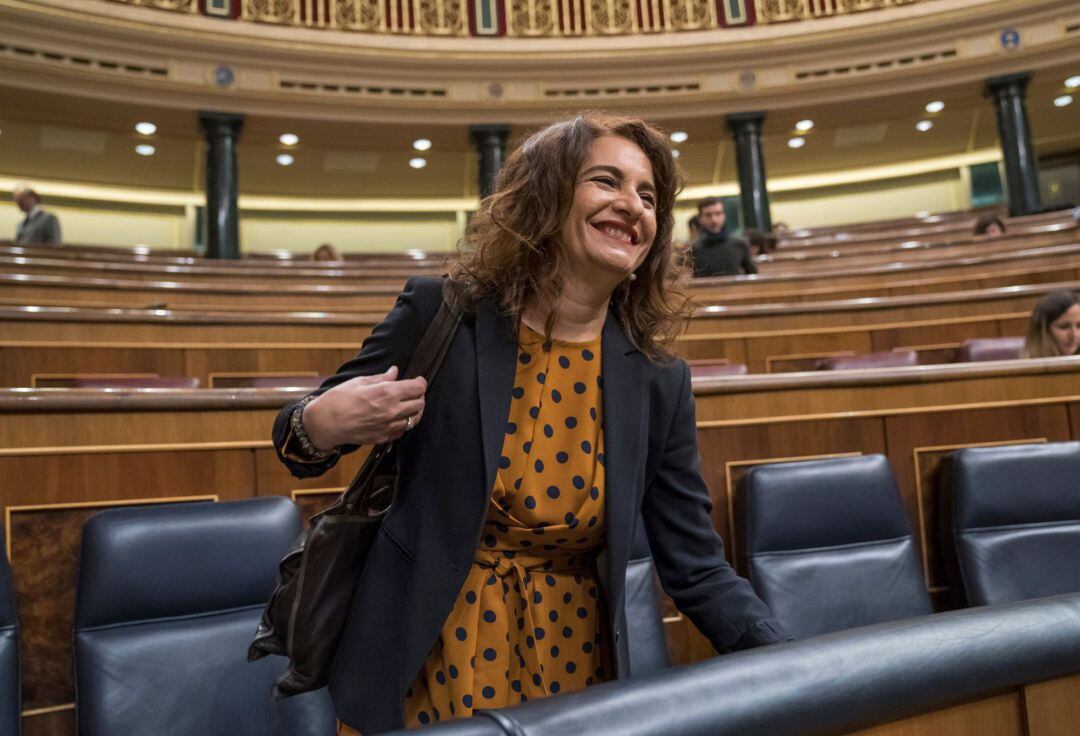 La Ministra de Hacienda María Jesús Montero, a su llegada al Pleno del Congreso de los Diputados