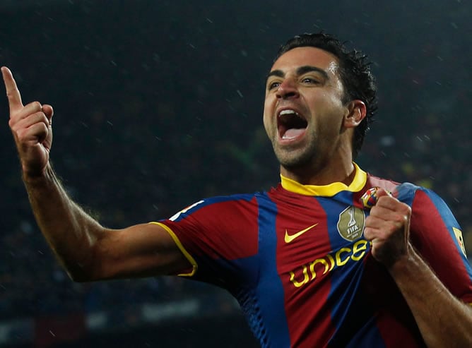 Xavi celebra el primer gol