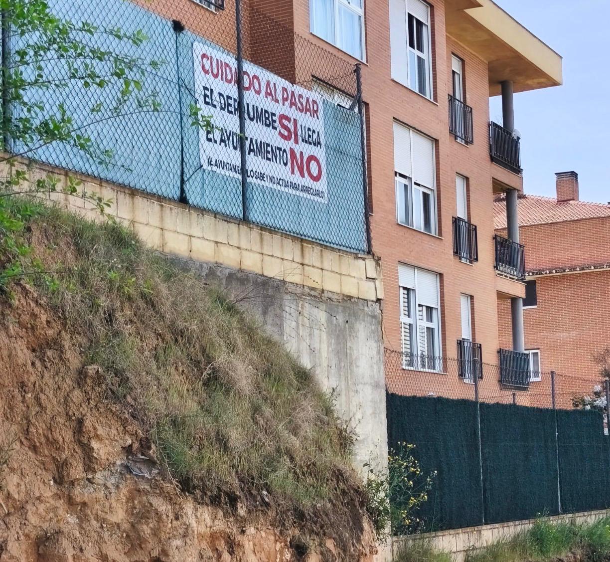 Talud y viviendas afectadas