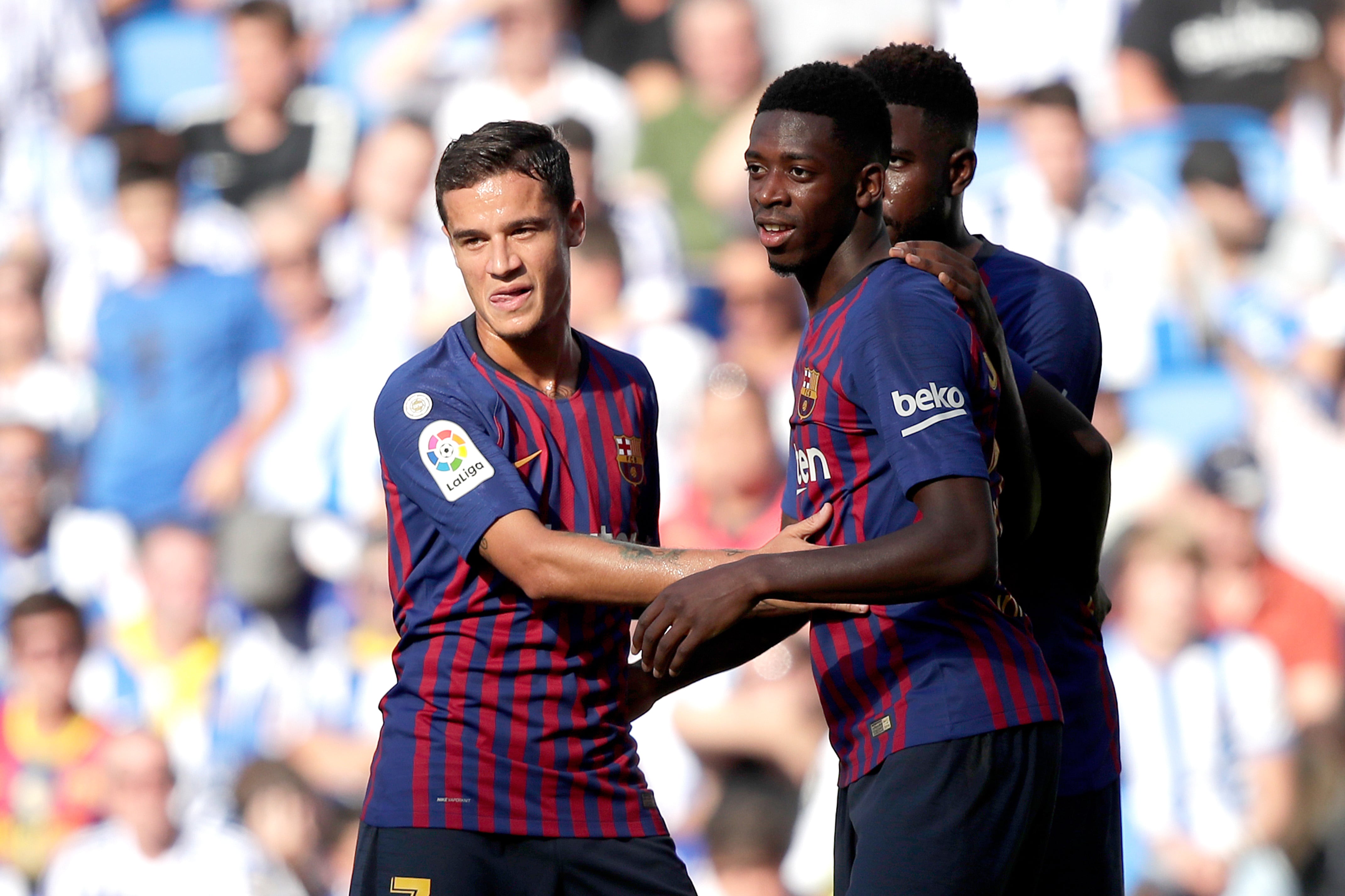 Philippe Coutinho y Ousmane Dembélé