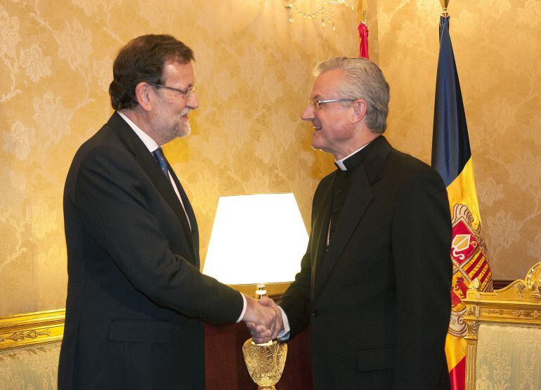Rajoy saluda Vives al Palau Episcopal
