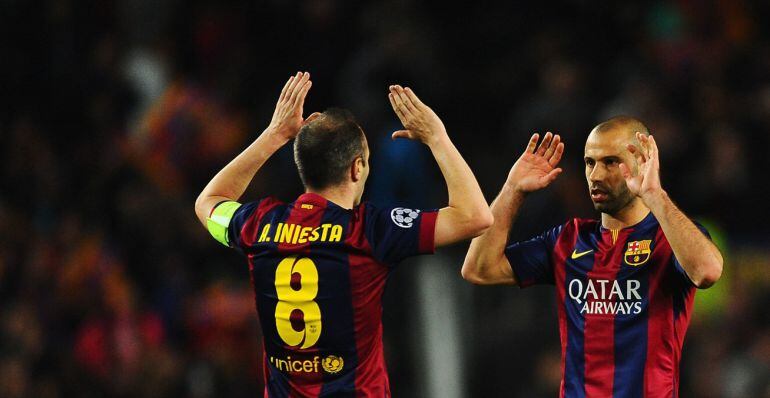 BARCELONA, SPAIN - MARCH 18:  Andres Iniesta of Barcelona celebrates victory with Javier Mascherano of Barcelona after the UEFA Champions League Round of 16 second leg match between Barcelona and Manchester City at Camp Nou on March 18, 2015 in Barcelona,