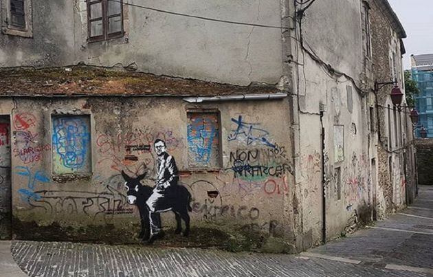 La obra de PrimoBanksy en la que se puede ver a Mariano Rajoy sobre un burro