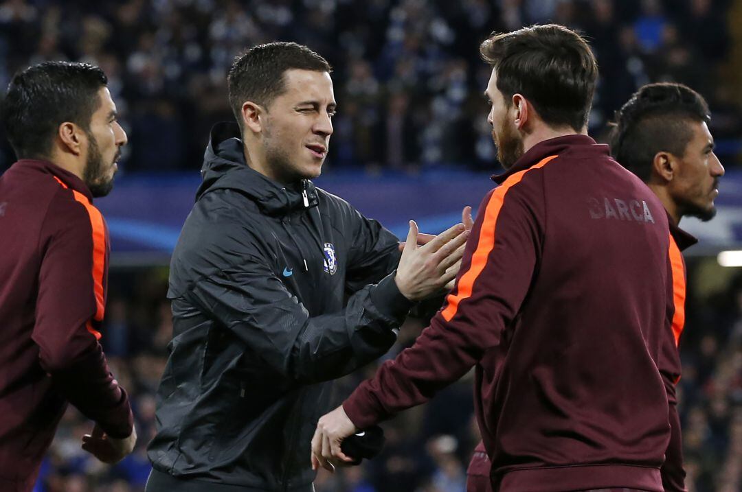 Eden Hazard y Leo Messi durante un encuentro entre el Chelsea y el FC Barcelona de Liga de Campeones.