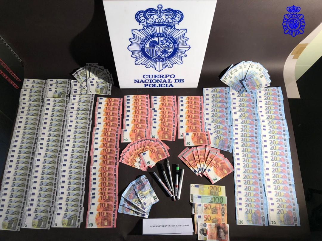 Dinero falso y material intervenido