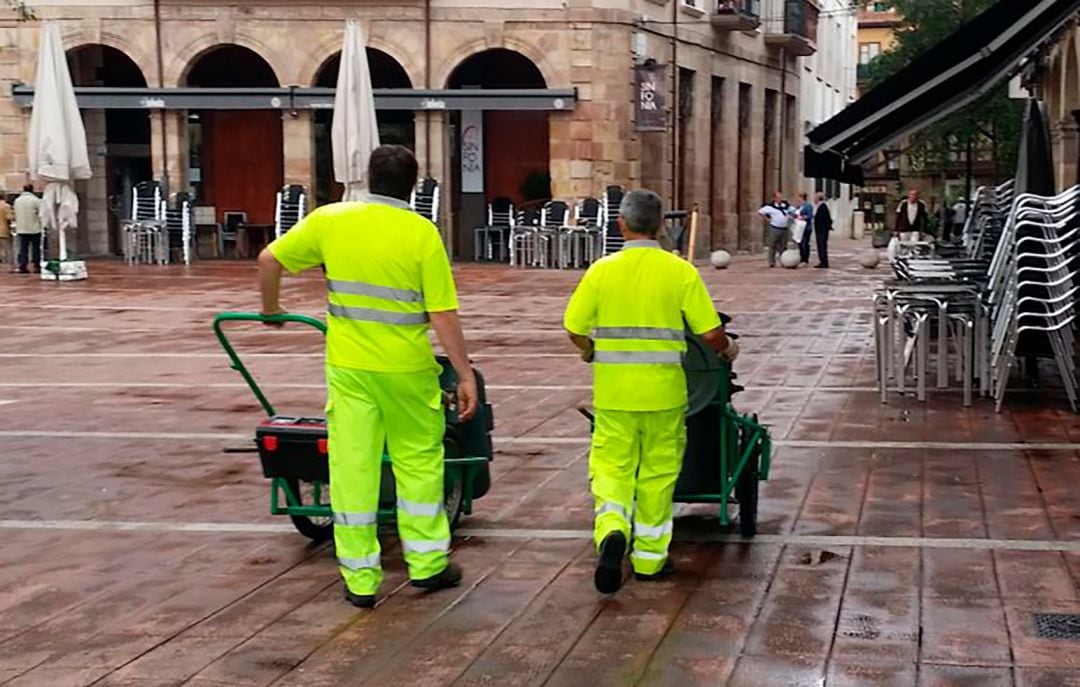 Barrenderos en la calle