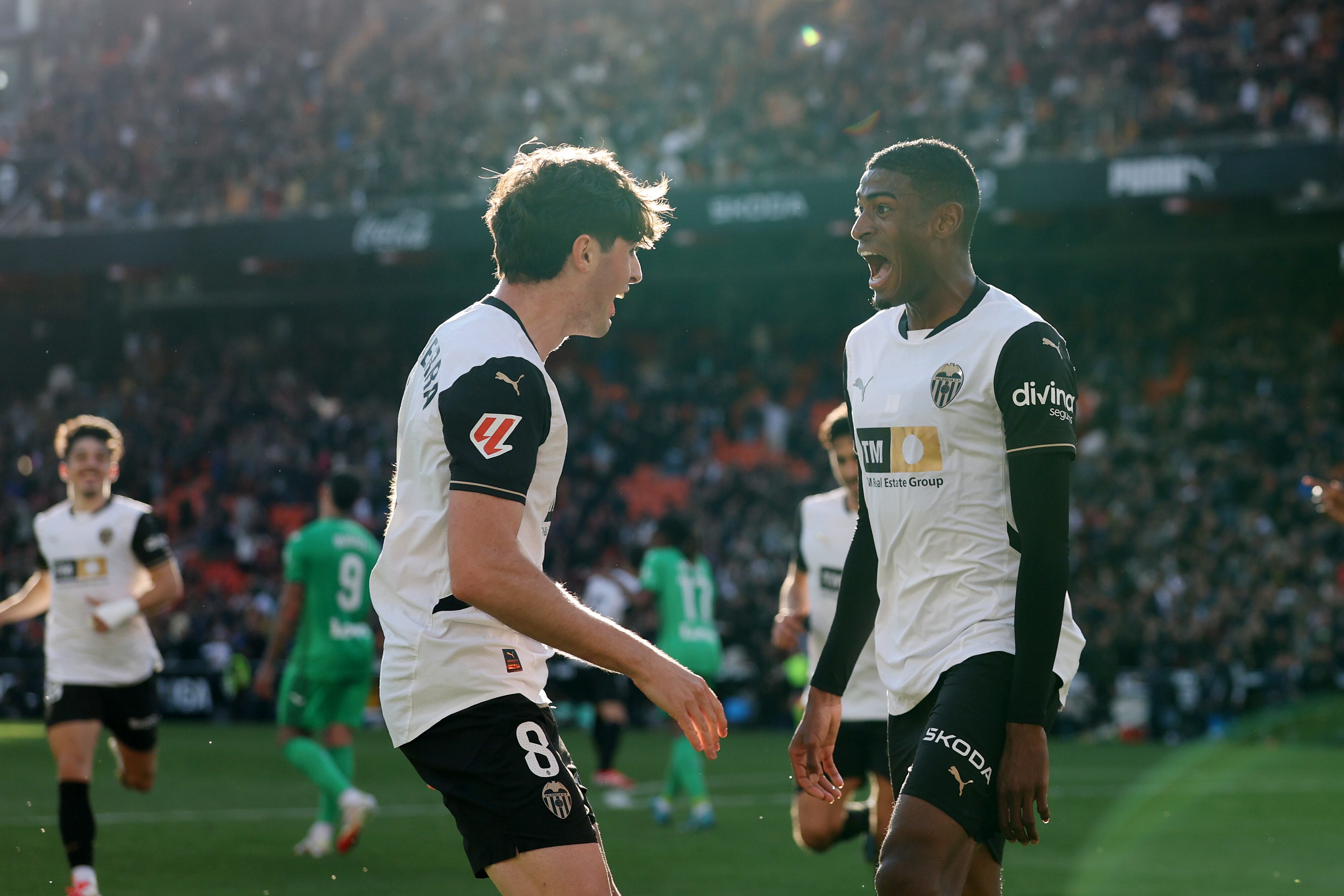 VALENCIA, SPAIN - FEBRUARY 09: Cristhian Mosquera of Valencia CF celebrates with teammate Javi Guerra after scoring his team&#039;s first goal during the LaLiga match between Valencia CF and CD Leganes at Estadio Mestalla on February 09, 2025 in Valencia, Spain. (Photo by Clive Brunskill/Getty Images)