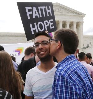 Gay rights supporters celebrate after the U.S. Supreme Court ruled that the U.S. Constitution provides same-sex couples the right to marry, outside the Supreme Court building in Washington, June 26, 2015. The court ruled 5-4 that the Constitution&#039;s guaran