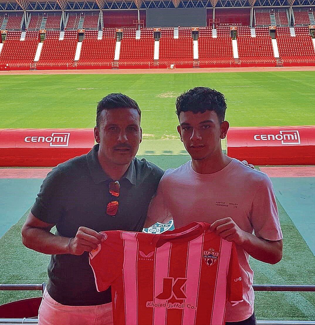 Iniesta con Marco Navas, su representante y hermano de Jesús Navas.