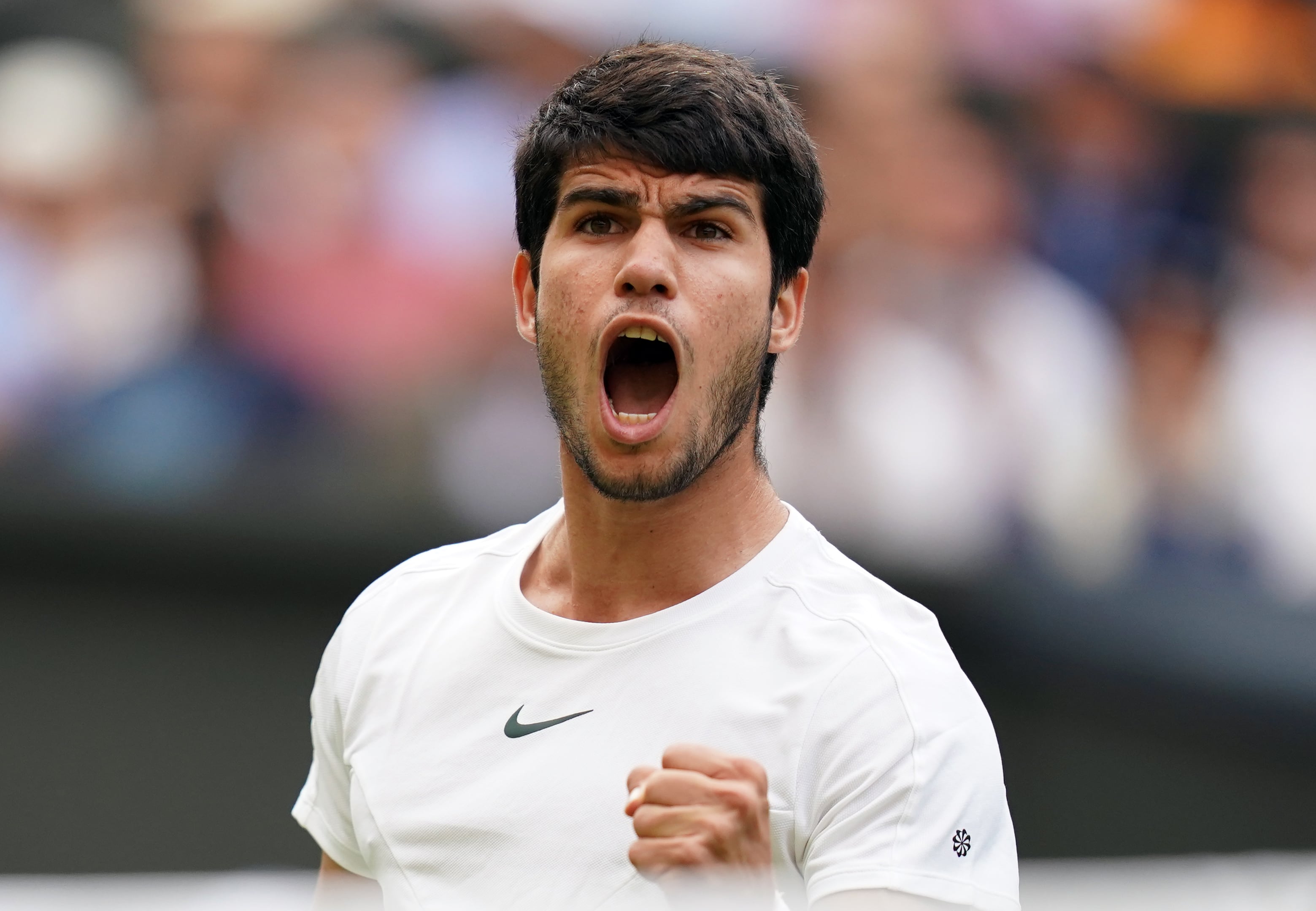 Carlos Alcaraz reacts after winning the second set against Matteo Berrettini on day eight of the 2023 Wimbledon Championships at the All England Lawn Tennis and Croquet Club in Wimbledon. Picture date: Monday July 10, 2023. (Photo by John Walton/PA Images via Getty Images)