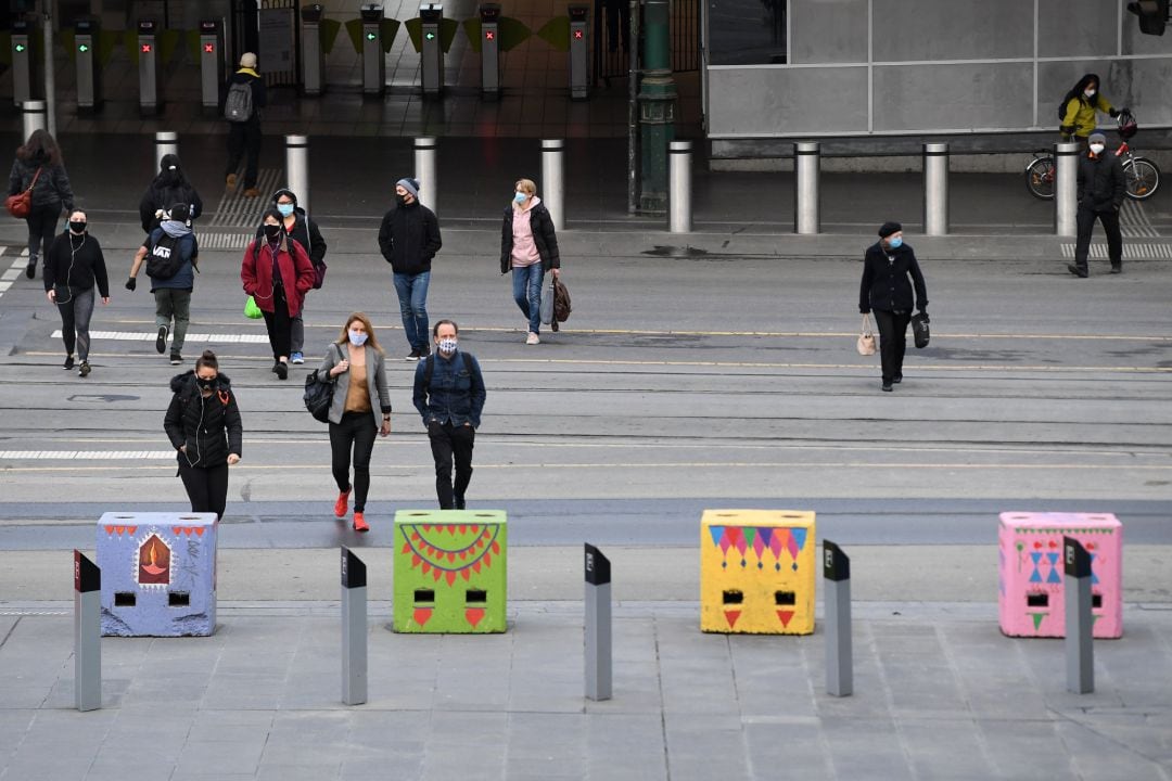 Ciudadanos con mascarilla en Melbourne (Australia)