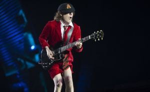 El guitarrista del grupo de rock australiano ACDC, Angus Young, durante el concierto de su gira mundial &quot;Rock od Bust&quot; ofrecido anoche en el estadio de La Cartuja