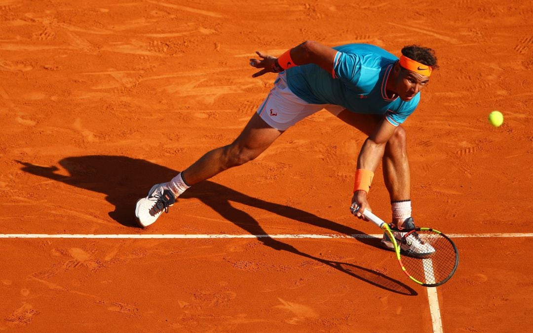 Rafael Nadal en una acción ante Guido Pella.