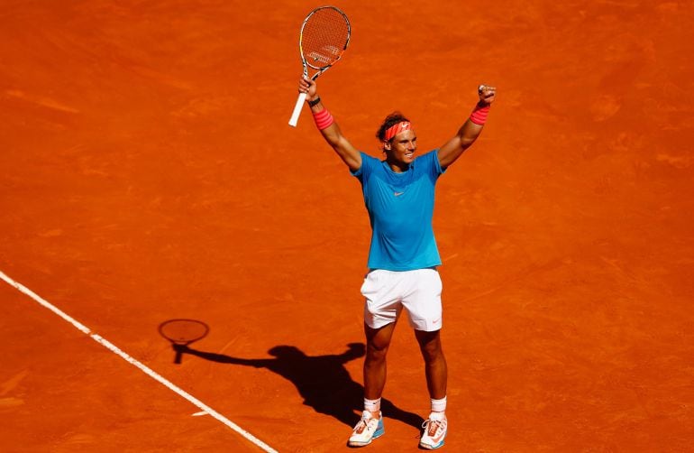 MADRID, SPAIN - MAY 09:  Rafael Nadal of Spain celebrates defeating Tomas Berdych of Czech Republic in the semi finals during day eight of the Mutua Madrid Open tennis tournament at the Caja Magica on May 9, 2015 in Madrid, Spain.  (Photo by Julian Finney