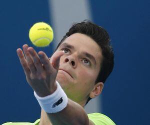 Milos Raonic of Canada serves to Sam Groth of Australia during their men&#039;s singles quarter final at the Brisbane International tennis tournament in Brisbane, January 9, 2015. REUTERS/Jason Reed (AUSTRALIA - Tags: SPORT TENNIS)