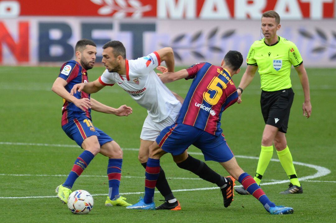 Jordi Alba y Sergio Busquets durante un partido con el Barça