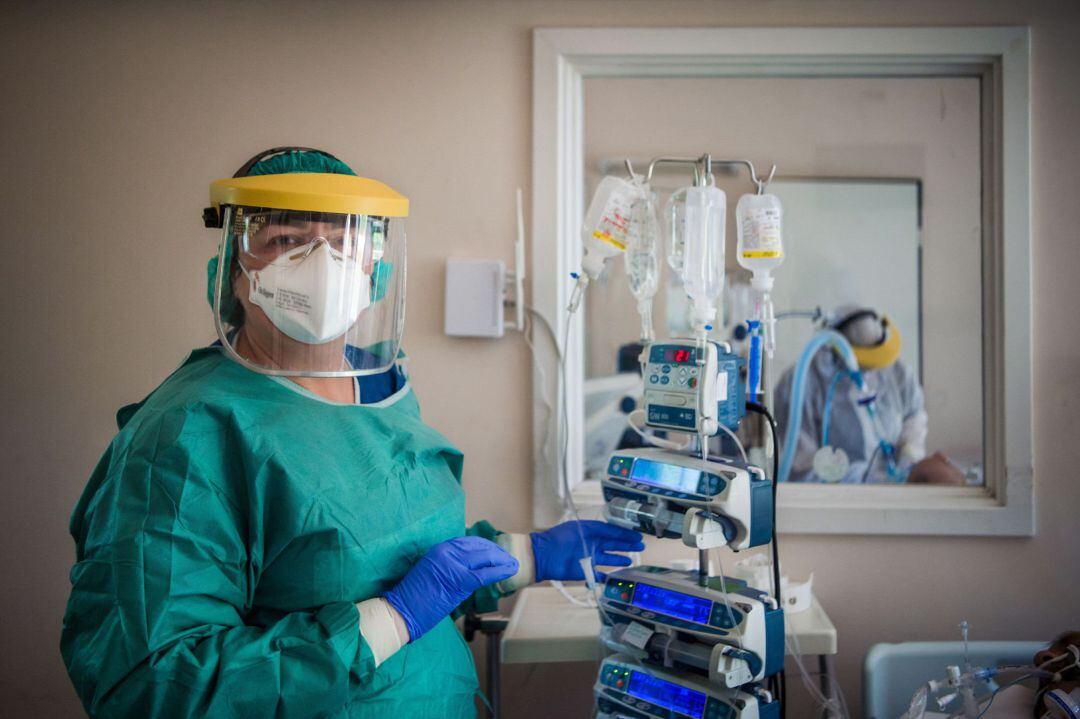 Nurse Szilvia Molnar wearing a protective gear poses for a photo at the Intensive Care unit for patients with the COVID-19 disease in the Szent Laszlo Hospital