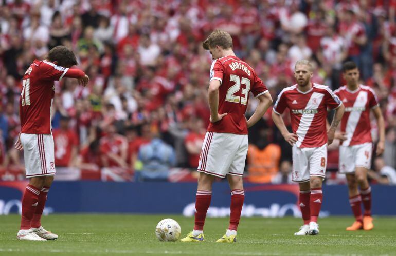 Football - Norwich City v Middlesbrough - Sky Bet Football League Championship Play-Off Final - Wembley Stadium - 25/5/15 Middlesbrough&#039;s Patrick Bamford and Jelle Vossen look dejected after Norwich City&#039;s second goal
 Action Images via Reuters / Tony O&#039;Brien
 Livepic
 EDITORIAL USE ONLY. No use with unauthorized audio, video, data, fixture lists, club/league logos or &quot;live&quot; services. Online in-match use limited to 45 images, no video emulation. No use in betting, games or single club/league/player publications.  Please contact your account representative for further details.