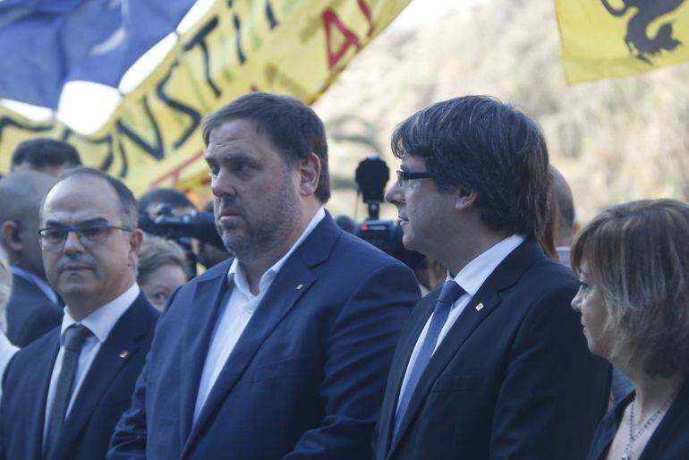 El vicepresidente del Govern, Oriol Junqueras, y el presidente, Carles Puigdemont en el acto de recuerdo a Lluis Companys.