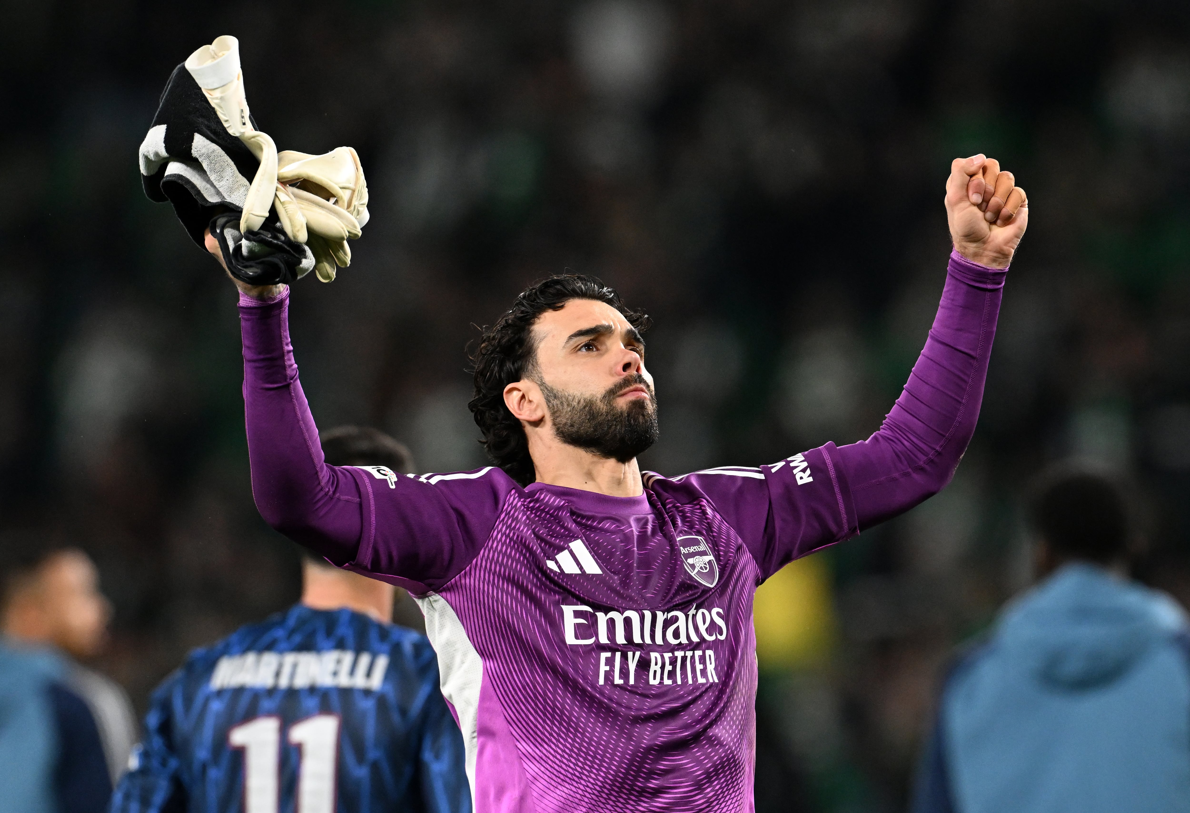 David Raya celebra la victoria del Arsenal frente al Sporting en Champions