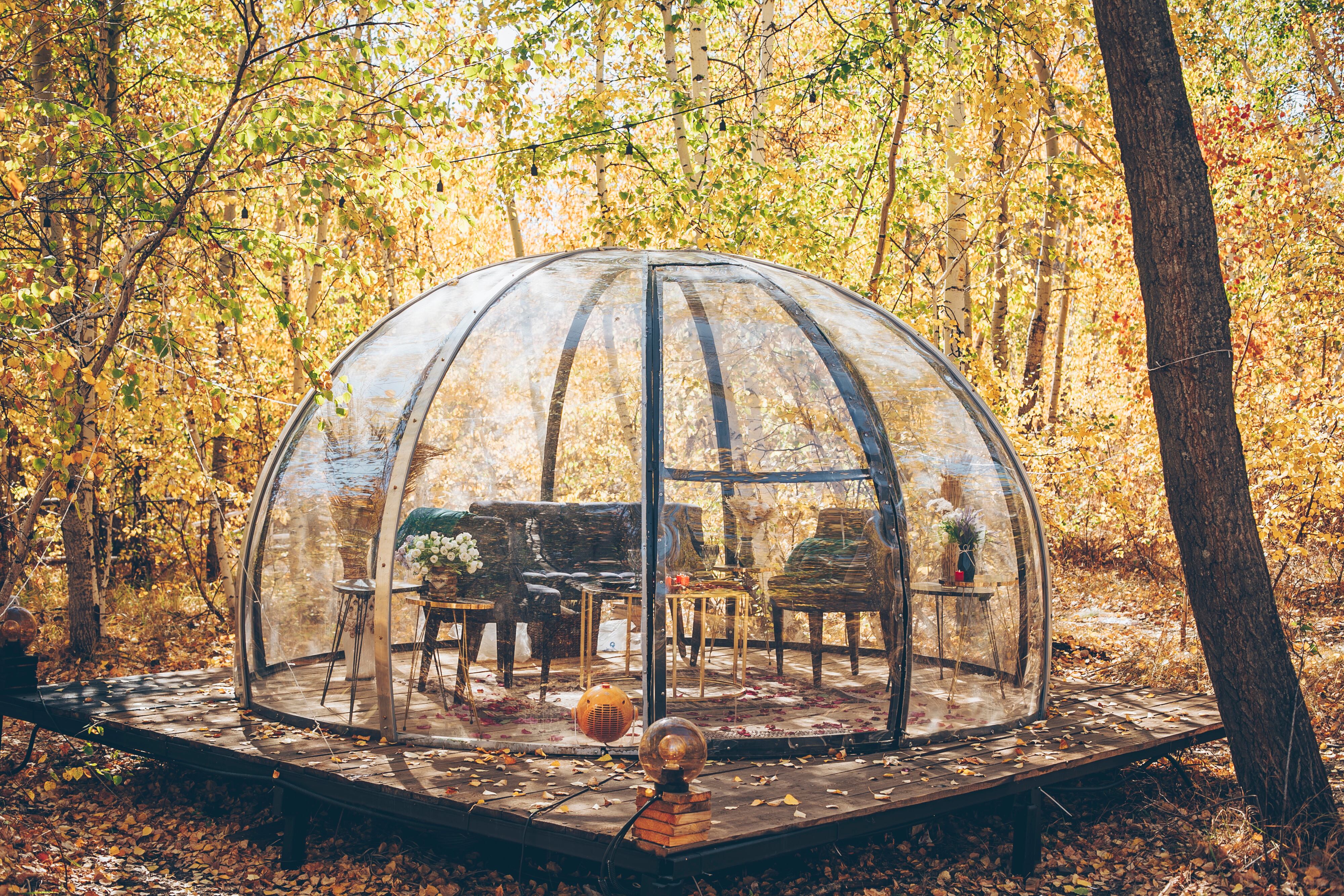 Camping, glamping, holiday, vacation lifestyle concept. Outdoors cabin, scenic autumn background