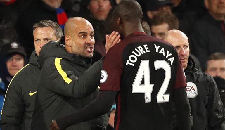 Pep Guardiola y Yaya Touré.