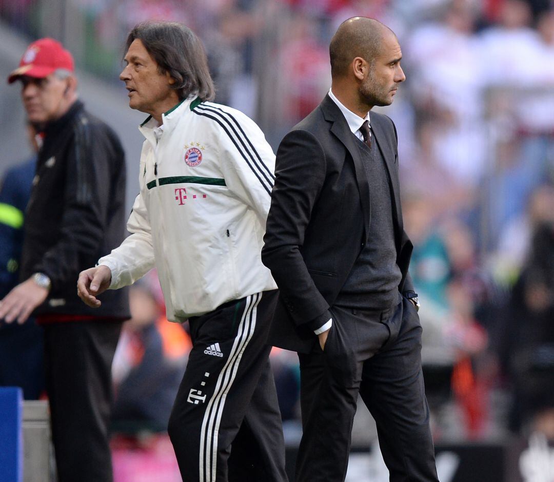 Müller-Wohlfahrt y Guardiola, durante un partido