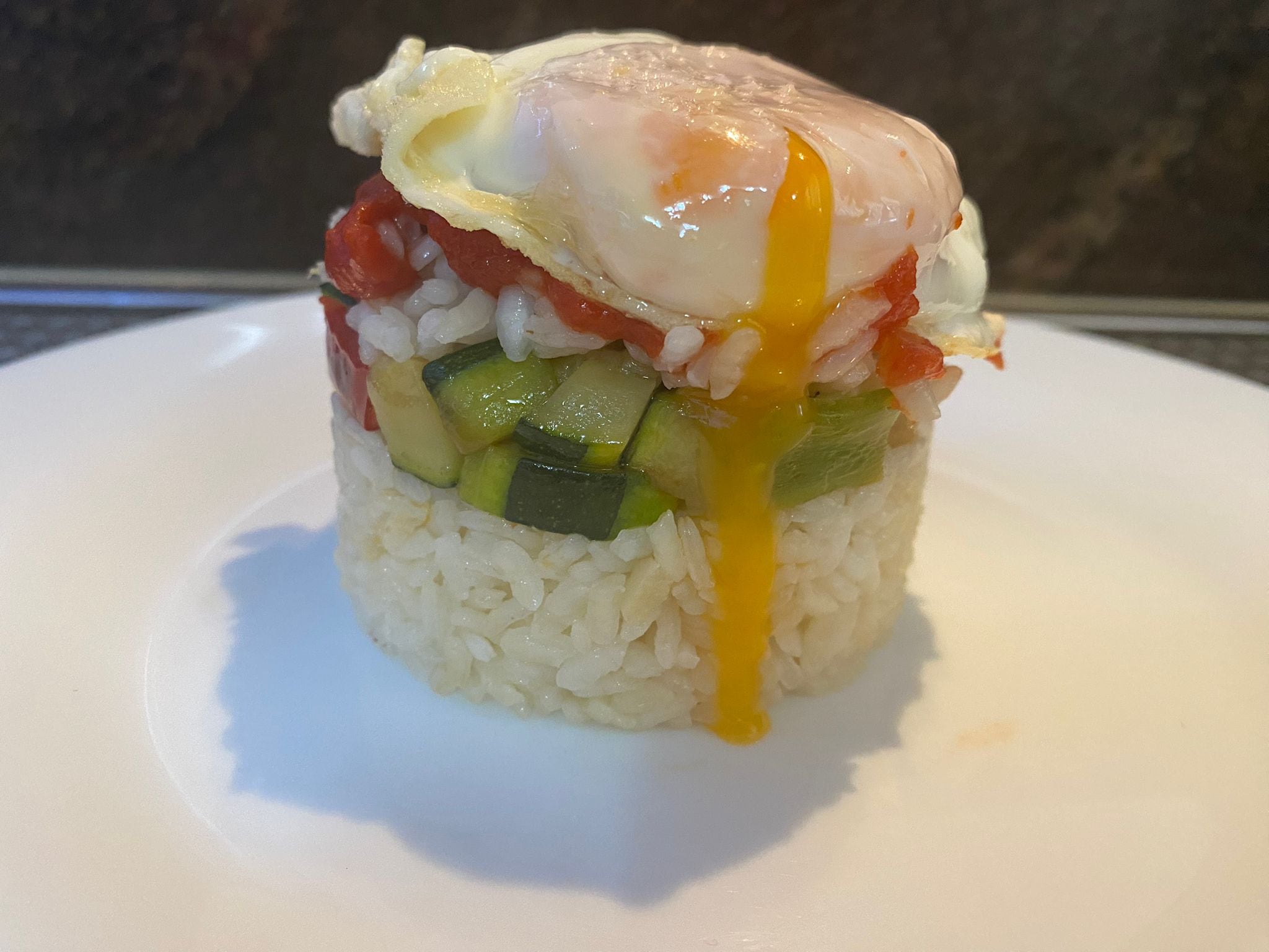 Tumbet con arroz y huevo frito.