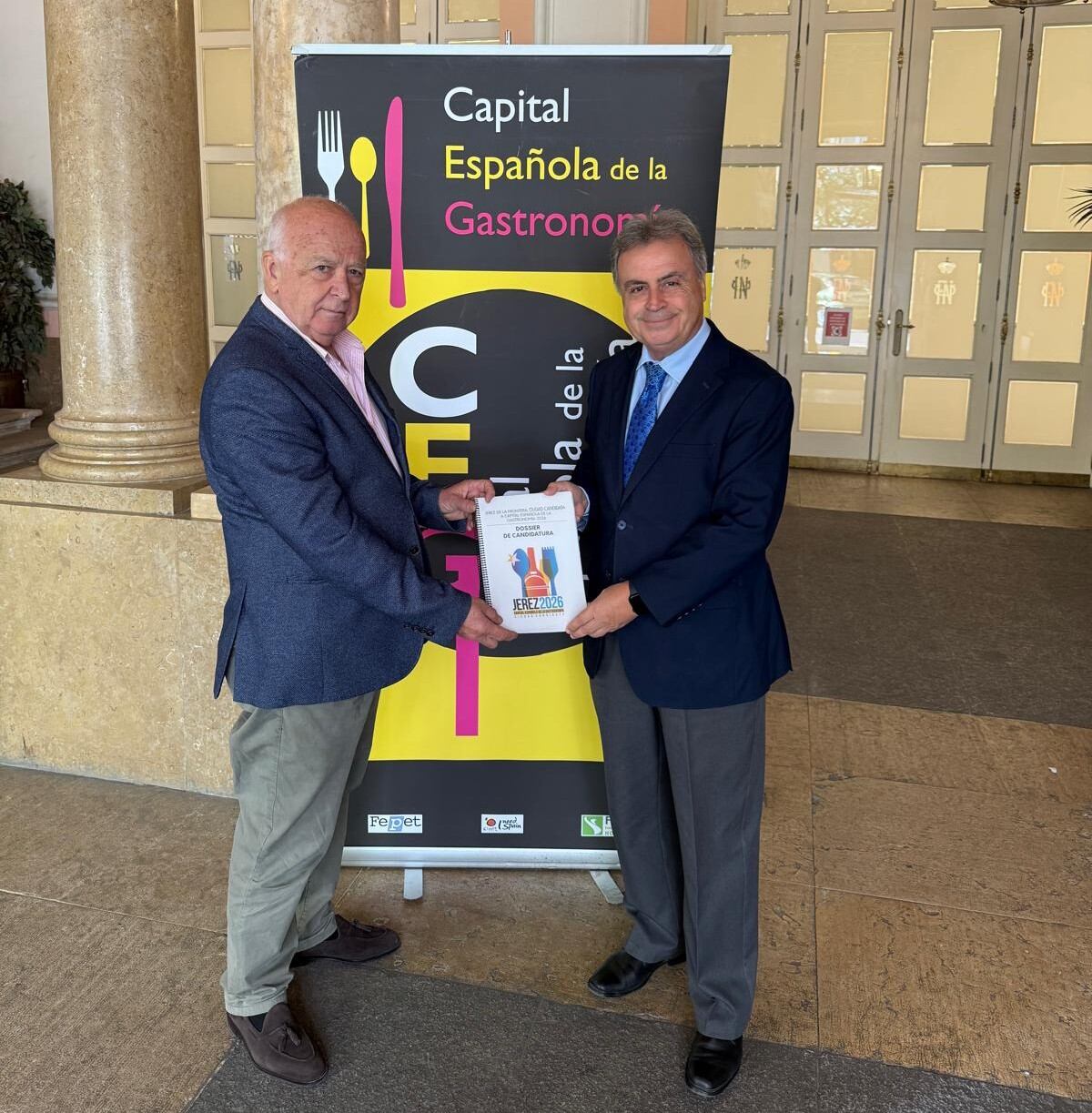 Pedro Palacios, director de la Oficinal de la “Capital española de la gastronomía", y Antonio Real, delegado municipal de Turismo, este miércoles en Madrid